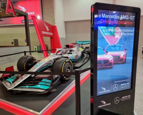 Crowdstrike's wrapped Totem Focus with F1 car behind