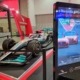 Crowdstrike's wrapped Totem Focus with F1 car behind