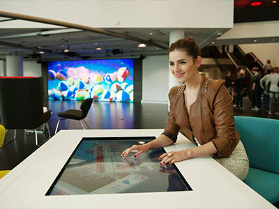 Interactive-Table Woman Using Interactive Table