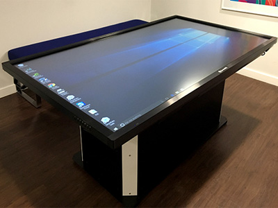 Woman Using Interactive Table