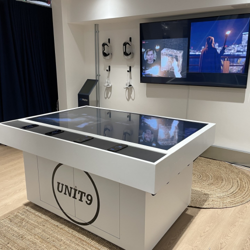 unit 9 personal table with meta kiosk in bg